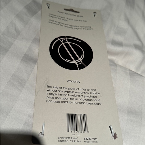 A set of 12 plate hangers.  Brand new. Adjustable 11 to 14 inches - Picture 2 of 3